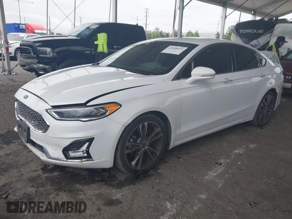 2019 Ford Fusion Titanium with VIN 3FA6P0K90KR236674, listed as a IAAI auction lot 42008633 with 99,737 mi miles and . Bid and sale history available at DreamBid. Image 17.
