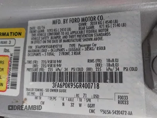 2016 Ford Fusion Titanium with VIN 3FA6P0K95GR400718, listed as a IAAI auction lot 41957913 with 133,037 mi miles. Bid and sale history available at carsss.com. Image 9.