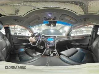 2014 Cadillac XTS Luxury z VIN 2G61N5S35E9133430, wystawiony jako Copart lot #54746235 z przebiegiem 157 544 mil mil oraz Szkoda całkowita • Salvage title. Historia ofert i sprzedaży dostępna na DreamBid. Obrazek 14.