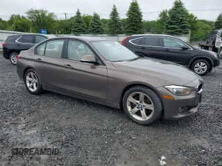 2014 BMW 3 Series 328i with VIN WBA3C1C59EK112967, listed as a Copart auction lot 61473605 with 151,905 mi miles and Clean title. Bid and sale history available at DreamBid. Image 4.