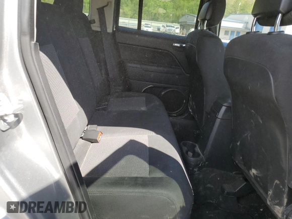 2014 Jeep Patriot Sport with VIN 1C4NJRBB0ED847977, listed as a Copart auction lot 55670985 with 98,042 mi miles and Salvage Title. Bid and sale history available at DreamBid. Image 11.