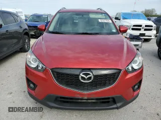2014 Mazda CX-5 Touring with VIN JM3KE2CY6E0316041, listed as a Copart auction lot 52227835 with 69,921 mi miles and Salvage Title. Bid and sale history available at DreamBid. Image 5.