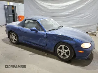 1999 Mazda MX-5 Miata with VIN JM1NB3532X0136645, listed as a Copart auction lot 59480265 with 160,936 mi miles and Clean title. Bid and sale history available at DreamBid. Image 4.