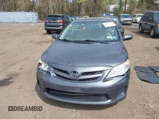 2011 Toyota Corolla L with VIN 2T1BU4EE4BC542333, listed as a IAAI auction lot 42122502 with 100,331 mi miles. Bid and sale history available at carsss.com. Image 12.