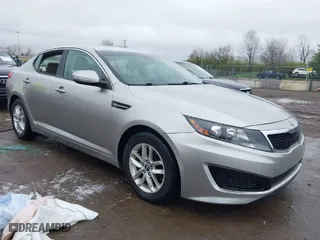 2011 Kia Optima LX with VIN KNAGM4A76B5146718, listed as a IAAI auction lot 42006225 with 213,939 mi miles. Bid and sale history available at carsss.com. Image 1.