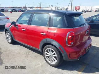 2015 MINI Countryman S z VIN WMWZC3C56FWT06095, wystawiony jako IAAI lot #41856493 z przebiegiem 44 699 mil mil oraz . Historia ofert i sprzedaży dostępna na DreamBid. Obrazek 3.