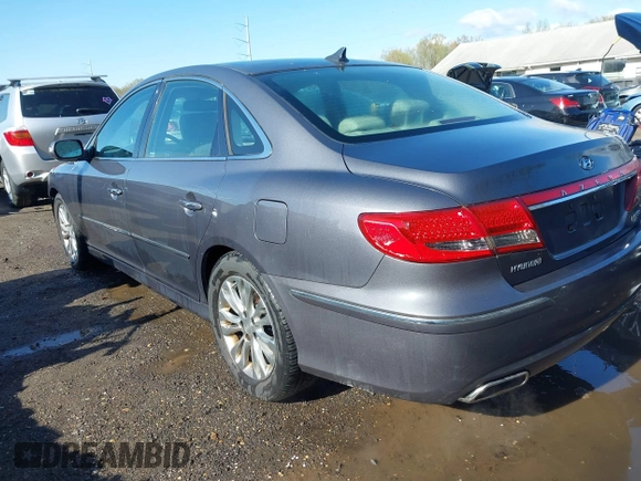 2011 Hyundai Azera Limited z VIN KMHFC4DF4BA559227, wystawiony jako IAAI lot #41975114 z przebiegiem 134 477 mil mil oraz . Historia ofert i sprzedaży dostępna na DreamBid. Obrazek 3.