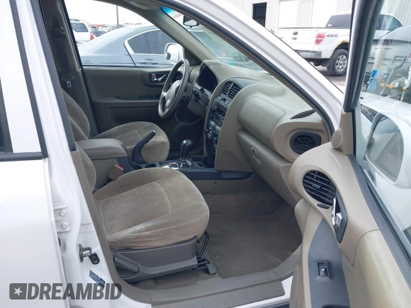 2004 Hyundai Santa Fe GLS with VIN KM8SC13DX4U609921, listed as a IAAI auction lot 41619492 with 113,592 mi miles. Bid and sale history available at carsss.com. Image 5.