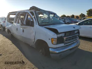 2001 Ford Econoline Passenger XL with VIN 1FMRE11LX1HA66495, listed as a Copart auction lot 70438864 with 306,671 mi miles and Salvage Title. Bid and sale history available at carsss.com. Image 4.