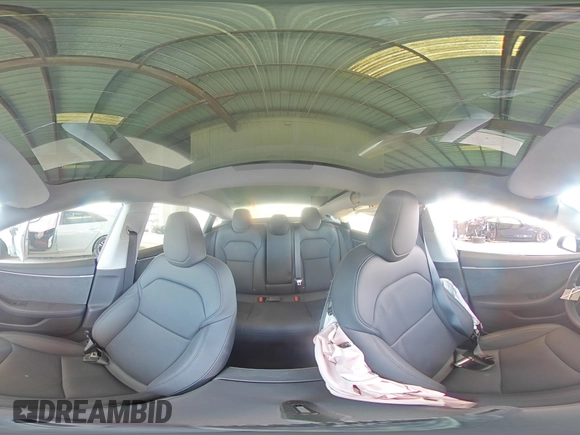 2025 Tesla Model 3 Long Range with VIN 5YJ3E1EBXSF941345, listed as a Copart auction lot 60229865 with 1,711 mi miles and Salvage title. Bid and sale history available at DreamBid. Image 14.