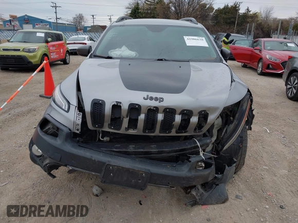 2016 Jeep Cherokee Trailhawk with VIN 1C4PJMBS7GW192574, listed as a IAAI auction lot 41986638 with 144,970 mi miles and . Bid and sale history available at DreamBid. Image 12.