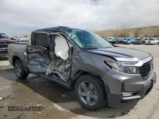2023 Honda Ridgeline RTL-E with VIN 5FPYK3F78PB010961, listed as a Copart auction lot 51458635 with 33,508 mi miles and Salvage title. Bid and sale history available at DreamBid. Image 4.