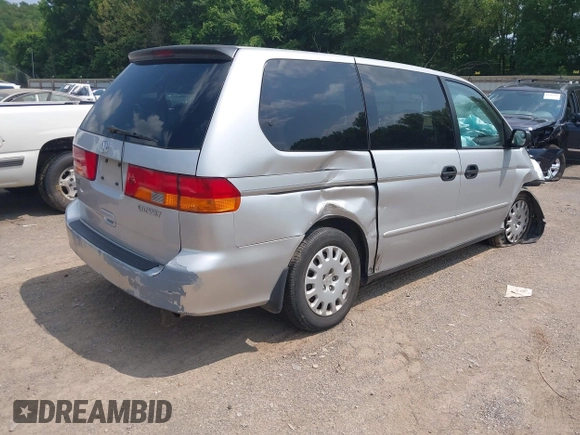 2004 Honda Odyssey LX with VIN 5FNRL18504B129349, listed as a IAAI auction lot 42393492 with 243,232 mi miles and . Bid and sale history available at DreamBid. Image 4.