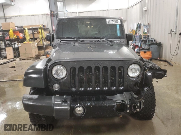 2017 Jeep Wrangler Willys Wheeler with VIN 1C4AJWAG9HL696710, listed as a Copart auction lot 88744905 with 66,800 mi miles and Salvage Title. Bid and sale history available at DreamBid. Image 5.