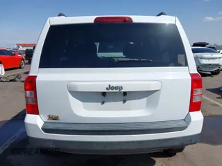 2011 Jeep Patriot Latitude with VIN 1J4NT1GB5BD245263, listed as a IAAI auction lot 41942376 with 215,147 mi miles. Bid and sale history available at carsss.com. Image 16.
