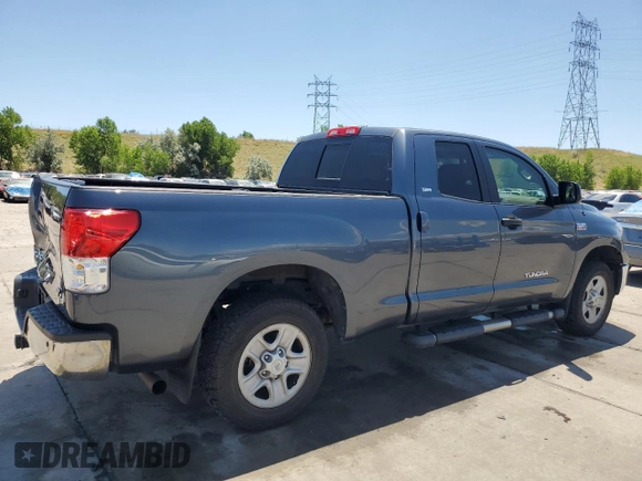 2010 Toyota Tundra with VIN 5TFUW5F14AX148898, listed as a Copart auction lot 63316765 with 79,983 mi miles and Salvage title. Bid and sale history available at DreamBid. Image 3.