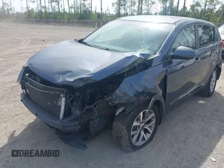 2015 Kia Sportage LX with VIN KNDPB3AC9F7757711, listed as a IAAI auction lot 41759749 with 179,111 mi miles and . Bid and sale history available at DreamBid. Image 6.