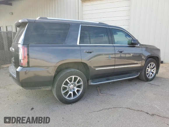 2018 GMC Yukon Denali with VIN 1GKS1CKJ4JR244135, listed as a Copart auction lot 71445964 with 148,375 mi miles and Salvage Title. Bid and sale history available at carsss.com. Image 3.