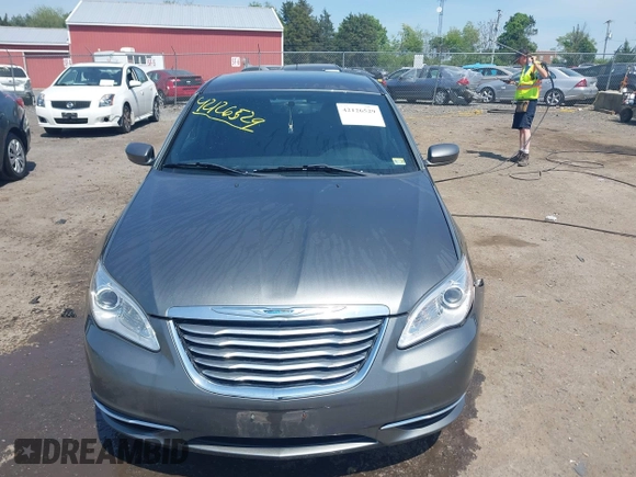 2012 Chrysler 200 Touring with VIN 1C3CCBBGXCN326023, listed as a IAAI auction lot 42126529 with 163,325 mi miles and . Bid and sale history available at carsss.com. Image 12.