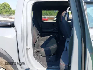 2023 Nissan Frontier SV with VIN 1N6ED1EK4PN622489, listed as a IAAI auction lot 42400562 with 25,595 mi miles and . Bid and sale history available at DreamBid. Image 8.