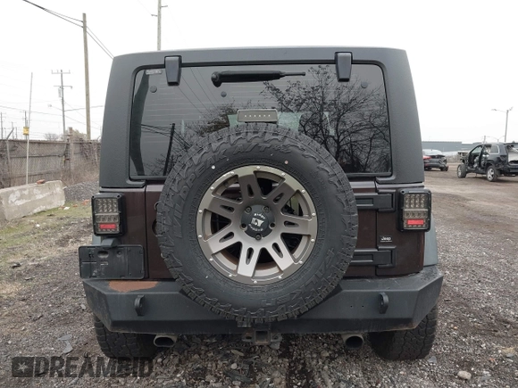 2013 Jeep Wrangler Sport with VIN 1C4AJWAG5DL679350, listed as a IAAI auction lot 40893582 with 61,191 mi miles and . Bid and sale history available at carsss.com. Image 16.