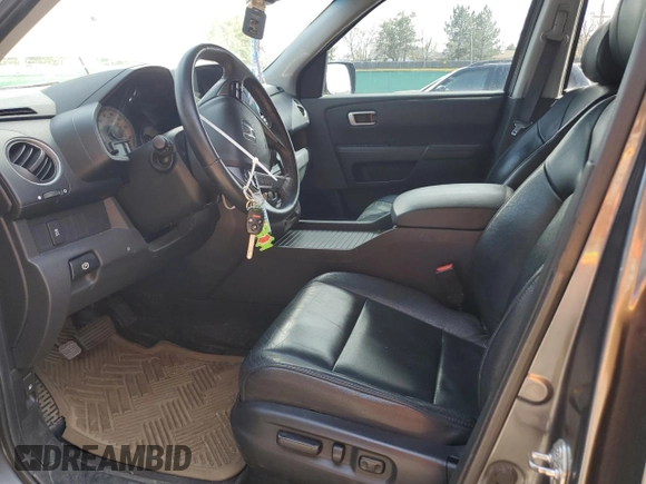 2012 Honda Pilot EX-L with VIN 5FNYF4H62CB069800, listed as a Copart auction lot 51977765 with 200,793 mi miles and Salvage Title. Bid and sale history available at carsss.com. Image 7.