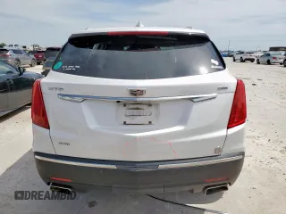 2018 Cadillac XT5 Premium Luxury AWD z VIN 1GYKNFRS7JZ239389, wystawiony jako Copart lot #56503575 z przebiegiem 137 222 mil mil oraz Szkoda całkowita • Salvage title. Historia ofert i sprzedaży dostępna na DreamBid. Obrazek 6.