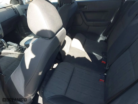 2009 Ford Focus SE with VIN 1FAHP35N79W166875, listed as a IAAI auction lot 41506700 with 174,061 mi miles. Bid and sale history available at carsss.com. Image 8.