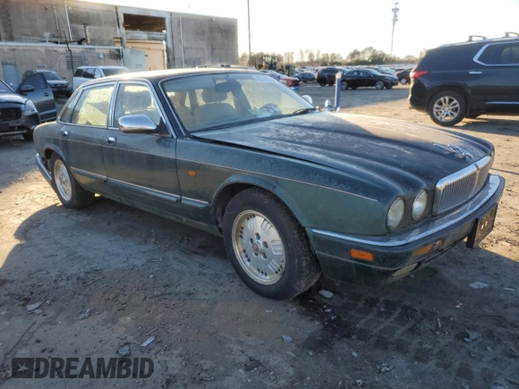 1995 Jaguar XJ with VIN SAJKX1747SC722815, listed as a Copart auction lot 83743934 with Not Provided miles and Clean Title. Bid and sale history available at DreamBid. Image 4.