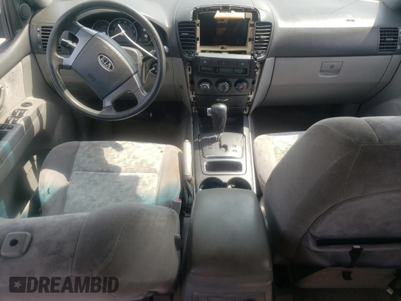 2007 Kia Sorento LX z VIN KNDJD736475691337, wystawiony jako Copart lot #57889615 z przebiegiem 279 716 mil mil oraz Szkoda całkowita • Salvage title. Historia ofert i sprzedaży dostępna na DreamBid. Obrazek 8.