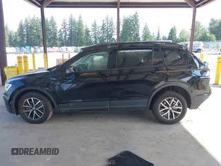 2021 Volkswagen Tiguan S with VIN 3VV0B7AX1MM098300, listed as a IAAI auction lot 42574636 with 53,559 mi miles and . Bid and sale history available at DreamBid. Image 14.