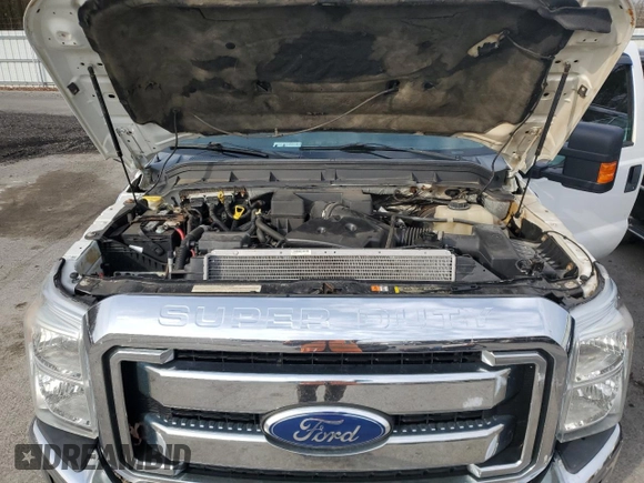 2012 Ford F-250 XL z VIN 1FTBF2B63CEA19489, wystawiony jako Copart lot #50071255 z przebiegiem 124 268 mil mil oraz Szkoda całkowita • Salvage title. Historia ofert i sprzedaży dostępna na DreamBid. Obrazek 11.