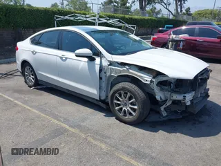 2016 Ford Fusion S z VIN 3FA6P0G75GR147200, wystawiony jako IAAI lot #42541067 z przebiegiem 180 415 mil mil oraz . Historia ofert i sprzedaży dostępna na DreamBid. Obrazek 1.