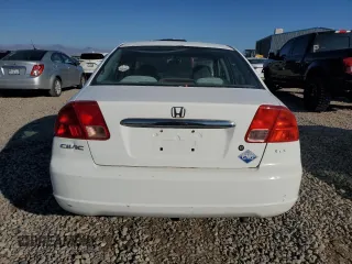 2002 Honda Civic z VIN 1HGEN26532L000390, wystawiony jako Copart lot #80095344 z przebiegiem 162 638 mil mil oraz Czysty tytuł • Clean title. Historia ofert i sprzedaży dostępna na DreamBid. Obrazek 6.