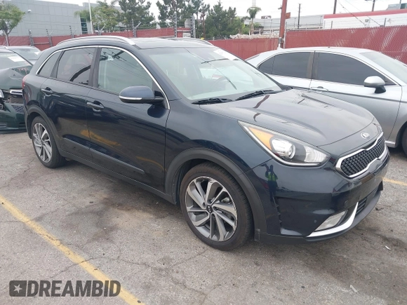 2017 Kia Niro Touring with VIN KNDCE3LC6H5048381, listed as a IAAI auction lot 42035129 with 133,559 mi miles. Bid and sale history available at carsss.com. Image 1.