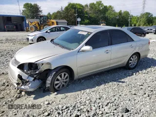 2003 Toyota Camry LE z VIN JTDBF30K430096391, wystawiony jako Copart lot #55494315 z przebiegiem 141 544 mil mil oraz Szkoda całkowita • Salvage title. Historia ofert i sprzedaży dostępna na DreamBid. Obrazek 1.