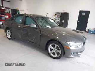 2015 BMW 3 Series 328i with VIN WBA3A5C57FF609734, listed as a IAAI auction lot 41392336 with 121,378 mi miles. Bid and sale history available at carsss.com. Image 1.
