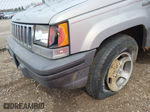 1995 Jeep Grand Cherokee Laredo with VIN 1J4GZ58S4SC532578, listed as a IAAI auction lot 41936041 with 161,777 mi miles. Bid and sale history available at carsss.com. Image 6.