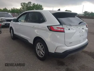 2024 Ford Edge SEL z VIN 2FMPK4J90RBA77889, wystawiony jako IAAI lot #42484303 z przebiegiem 51 211 mil mil oraz . Historia ofert i sprzedaży dostępna na DreamBid. Obrazek 3.