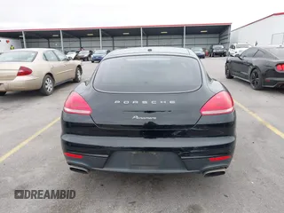 2015 Porsche Panamera 4 с VIN WP0AA2A70FL002802, выставлен на аукционе IAAI как лот 41303802 с пробегом 58 496 миль миль и . История ставок и продаж доступна на DreamBid. Изображение 16.
