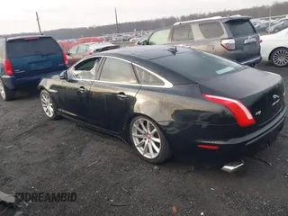 2014 Jaguar XJ with VIN SAJWA1CZXE8V74400, listed as a IAAI auction lot 38250698 with 102,205 mi miles and . Bid and sale history available at DreamBid. Image 3.
