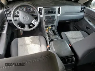 2009 Jeep Grand Cherokee Laredo with VIN 1J8GR48K89C500719, listed as a Copart auction lot 51425085 with 127,896 mi miles and Salvage Title. Bid and sale history available at carsss.com. Image 8.