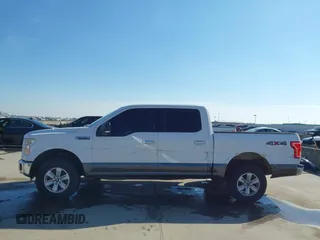 2016 Ford F-150 XLT with VIN 1FTEW1EF7GFA28134, listed as a IAAI auction lot 41398965 with 218,577 mi miles and . Bid and sale history available at DreamBid. Image 14.