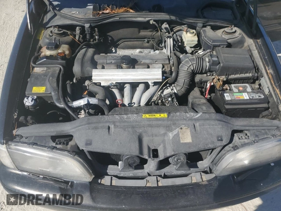 1999 Volvo S70 z VIN YV1LS55A1X1602877, wystawiony jako Copart lot #74921134 z przebiegiem 299 173 mil mil oraz Szkody całkowita. Historia ofert i sprzedaży dostępna na DreamBid. Obrazek 12.