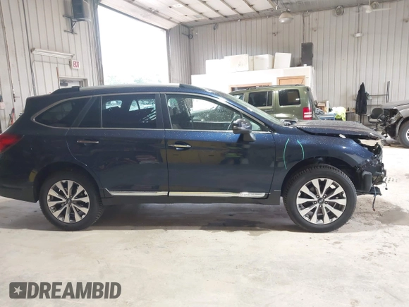 2018 Subaru Outback Touring with VIN 4S4BSATC2J3225238, listed as a IAAI auction lot 42505972 with 152,013 mi miles and . Bid and sale history available at DreamBid. Image 14.