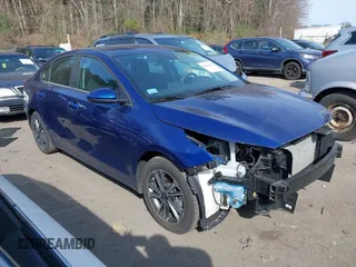 2023 Kia Forte LXS z VIN 3KPF24AD2PE532414, wystawiony jako IAAI lot #42020656 z przebiegiem 52 446 mil mil oraz . Historia ofert i sprzedaży dostępna na DreamBid. Obrazek 1.