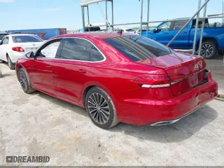 2022 Volkswagen Passat 2.0T Limited Edition with VIN 1VWBA7A30NC010134, listed as a IAAI auction lot 42052451 with 24,923 mi miles. Bid and sale history available at carsss.com. Image 3.