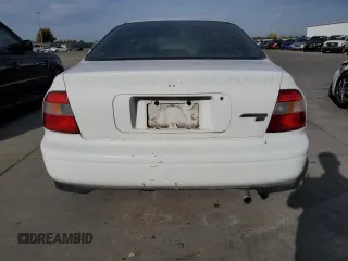 1994 Honda Accord LX with VIN 1HGCD7239RA023822, listed as a Copart auction lot 77522983 with 244,934 mi miles and Salvage Title. Bid and sale history available at carsss.com. Image 6.