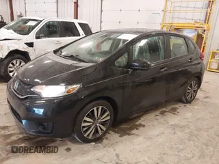 2015 Honda Fit EX-L with VIN 3HGGK5H84FM700823, listed as a IAAI auction lot 41488377 with 116,988 mi miles. Bid and sale history available at carsss.com. Image 2.
