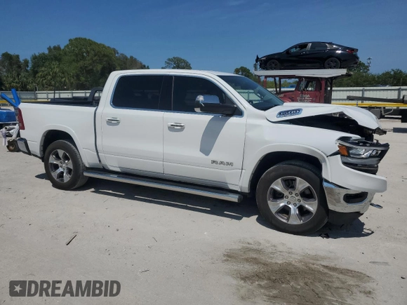 2020 Ram 1500 Laramie z VIN 1C6SRFJT5LN402007, wystawiony jako Copart lot #56427815 z przebiegiem 79 159 mil mil oraz Szkoda całkowita • Salvage title. Historia ofert i sprzedaży dostępna na DreamBid. Obrazek 4.